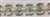 LNS-BED-151-SILVERWHITE.  Beaded Trim with Beautifully Arranged Whie Pearls, Clear Crystals, Beads, and Sequins on a White Mesh - Sold By the Yard - 1 Inch Wide