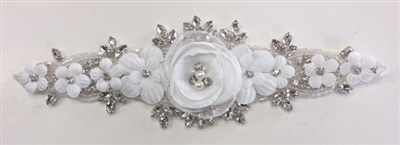 RHS-APL-006-SILVER. Hot-Fix / Sew-On Clear Crystal Rhinestone Applique - 9 x 3 Inches. Made with high quality clear crystals, Beads, Pearls and flowers with a layer of hot-fix glue on the back.