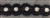 LNS-BED-150-BLACK.  Beaded Trim with Beautifully Arranged Black Pearls and Sequins on a Mesh - Sold By the Yard - 7/8 Inch Wide