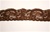 LST-REG-116-BROWN.  1.0"-wide Stretch Lace