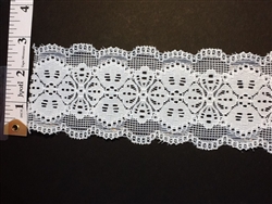 LST-REG-203 WHITE. STRETCH LACE 2 INCH WIDE