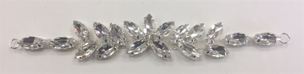 BKL-RHS-016-SILVER.  Clear Crystals on Silver Applique / Buckle - 6 X 1 Inches. Has hooks at booth ends. Very versatile accessory on garments and swim-suits. BKL-RHS-016-SILVER.  hebilla/aplicacion de cristal claro con diamante imitacion - 6 X 1 pulgada.