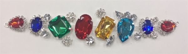 BKL-RHS-018-MULTISILVER.  Multi-Color Stones on Silver Metal Applique/Buckle - 8 X 1-7/8 Inches.  Has hooks at booth ends.  Very versatile accessory on garments and swim-suits.