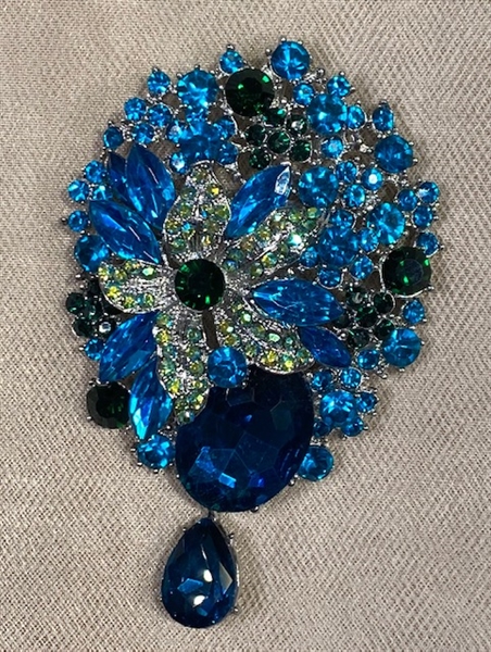 BRO-RHS-446-SILVERAQUA.  Silver Aqua Blue Rhinestone Brooch