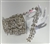CHN-RHS-058-SILVER. Clear Crystal Rhinestone Chain - Clear Point-Back Crystals Set in a Silver Claw on a Silver Metal Backing - 1 1/8 Inch Wide