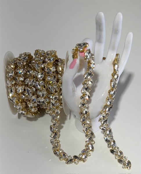 CHN-RHS-062-CLEARGOLD. Clear Crystal Rhinestone Chain On Gold Chain - Clear Crystals Set in Gold Claws on a Gold Metal Backing - 5/8 Inch Wide