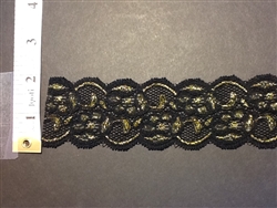 LST-REG-103-BLACKGOLD.  STRETCH LACE 1 INCH WIDE - BLACK GOLD
