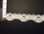 LST-REG-105-IVORY.  STRETCH LACE I INCH WIDE - IVORY