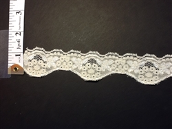 LST-REG-105-IVORY.  STRETCH LACE I INCH WIDE - IVORY