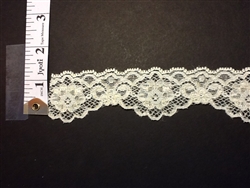 LST-REG-106-IVORY.  STRETCH LACE 1 INCH WIDE - IVORY