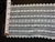 LST-REG-614-WHITEGREY.  STRETCH LACE 6 INCH WIDE - WHITE GREY