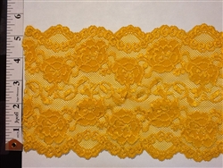 LST-REG-621-MUSTARD.  STRETCH LACE 6 INCH WIDE - MUSTARD