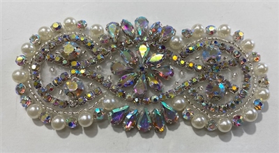RHS-APL-008-AB. Hot-Fix / Sew-On AB Crystal Rhinestone Applique - 4 x 2 Inches. Made with high quality clear crystals, Beads, and Pearls with a layer of hot-fix glue on the back.