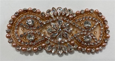 RHS-APL-008-ROSEGOLD. Hot-Fix / Sew-On Clear Crystal Rhinestone w/ Rose-Gold Beads Applique - 4 x 2 Inches. Made with high quality clear crystals, Beads, and Pearls with a layer of hot-fix glue on the back.