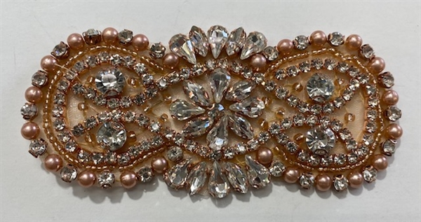 RHS-APL-008-ROSEGOLD. Hot-Fix / Sew-On Clear Crystal Rhinestone w/ Rose-Gold Beads Applique - 4 x 2 Inches. Made with high quality clear crystals, Beads, and Pearls with a layer of hot-fix glue on the back.