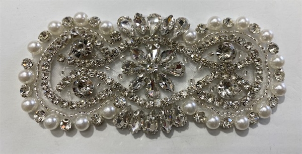 RHS-APL-008-SILVER. Hot-Fix / Sew-On Clear Crystal Rhinestone Applique - 4 x 2 Inches. Made with high quality clear crystals, Beads, and Pearls with a layer of hot-fix glue on the back.