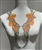 RHS-APL-3303-ORANGESILVER-PAIR. Orange and Clear Crystal Rhinestone Applique with Silver Beads on a Shear White Tulle- 15" x 3" Each Piece.