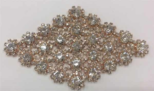 RHS-APL-M132-ROSEGOLD. Clear Rhinestones on Rose-Gold Metal Applique. 4 x 2.5 Inches