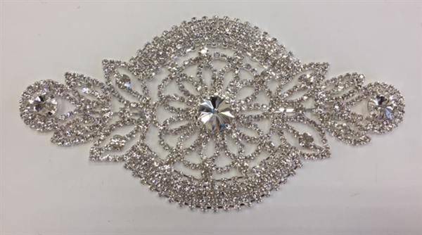 RHS-APL-M222-SILVER. Glue-On or Sew-On Clear Crystal Rhinestones on Silver Metal Applique - 7 x 4 Inches. Can be Used for Making Belts, Sashes, Head-Bands, Party Dresses and Costumes.